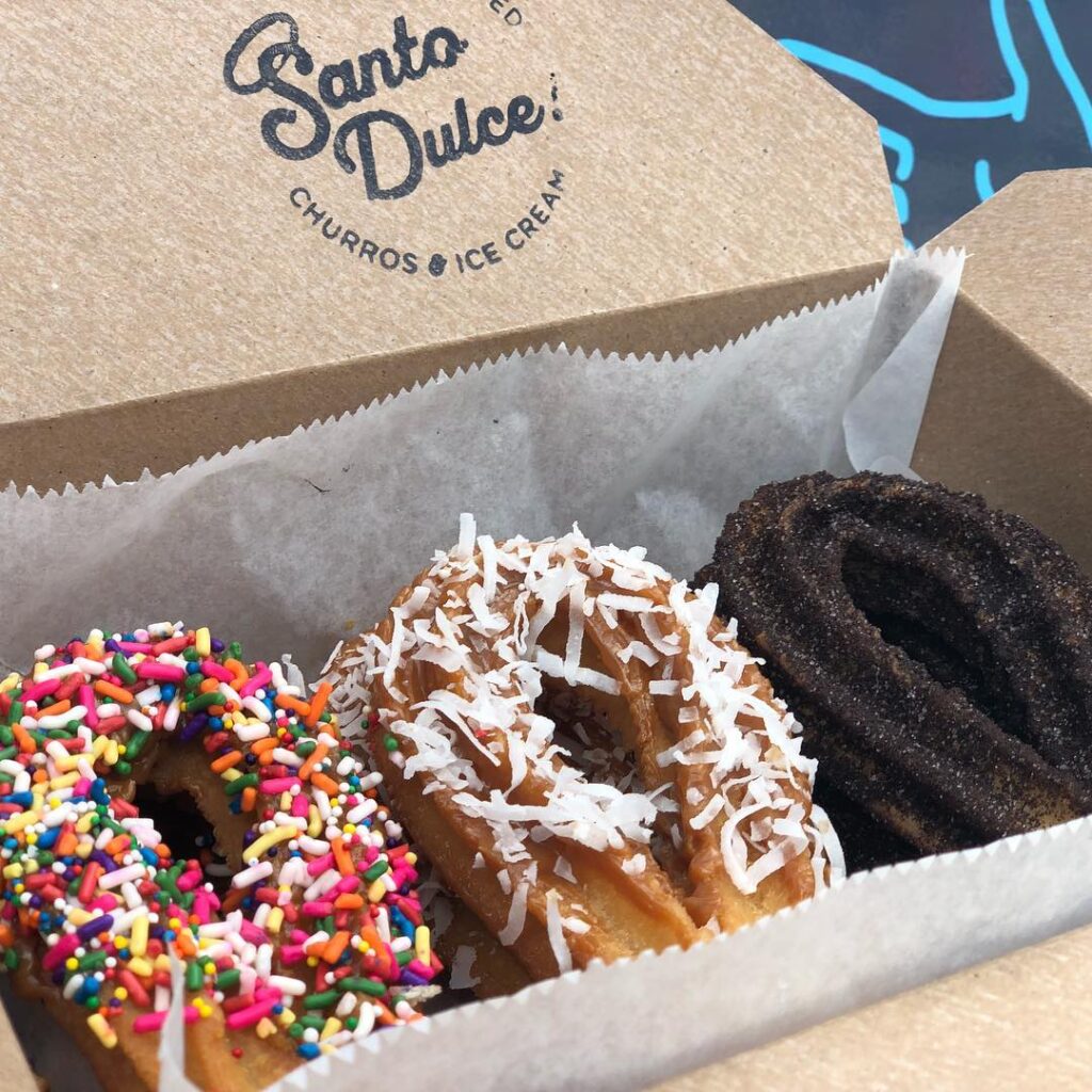 Santo Dulce! churros in a to-go box